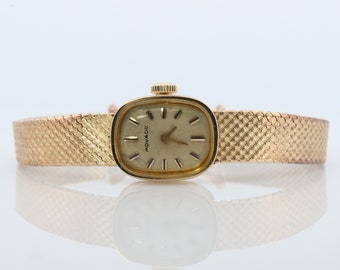 14k MOVADO Mechanical Watch. Movado Vintage Ladies watch with 14k Gold Mesh Bracelet.