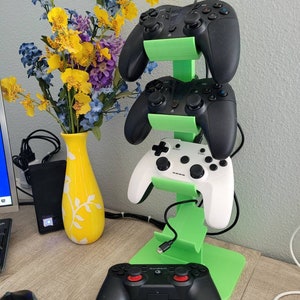 Video game controller tower, display up to 4 controllers, upright gamer storage, controller display solution