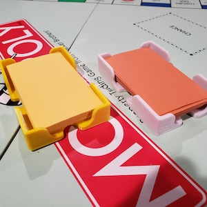 Les porte-cartes Monopoly Chance et Community Chest de 86 x 58 mm permettent de ranger et de ranger le tableau.