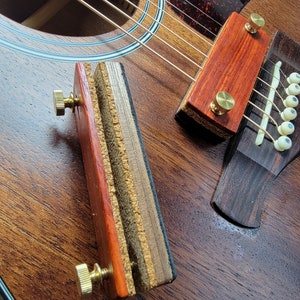 Guitar string clamp