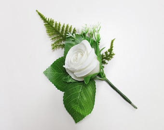 white rosebud buttonhole