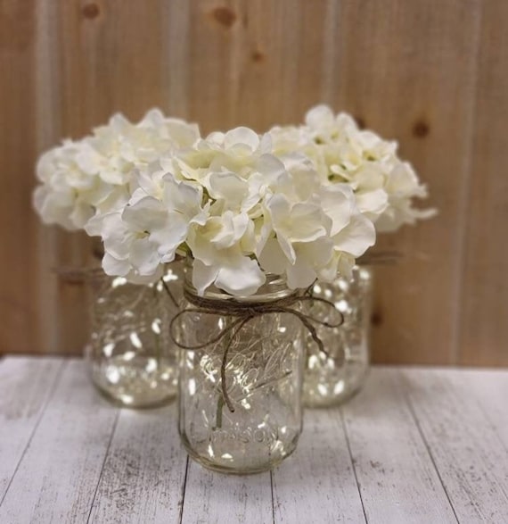 Lighted mason jars with flowers hotsell