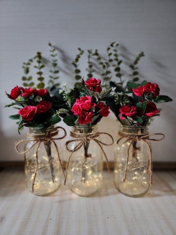 Lighted mason jars with cheap flowers