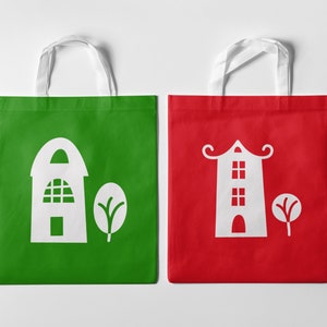 May include: Two reusable tote bags with white handles. The bag on the left is green with a white silhouette of a house and a tree. The bag on the right is red with a white silhouette of a tall house with a tree.