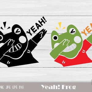 May include: Black and green frog with red shirt dabbing with the text "YEAH!" in orange and black.  The frog is on a white wood background.