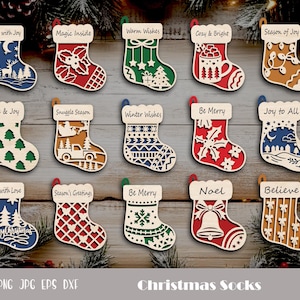 May include: A collection of twelve wooden Christmas stocking ornaments in various colors and designs. Each stocking has a unique cutout pattern and a tag with a holiday message. The text "Christmas Socks" is at the bottom.