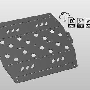 Könnte beinhalten: Eine graue Metallplatte mit einem Raster aus Löchern und Schlitzen. Die Platte ist zum Befestigen von Zubehör oder Werkzeugen gedacht.