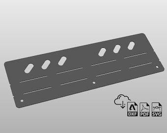 May include: A gray metal plate with multiple oval-shaped holes and horizontal lines cut out. The plate is designed for organizing and storing small items.
