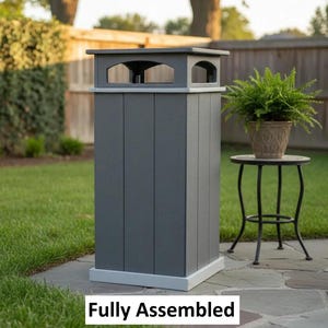 May include: A gray outdoor trash receptacle with a white trim and a decorative top with arched openings. The text "Fully Assembled" is at the bottom of the image. A small table with a potted plant is next to the trash can.