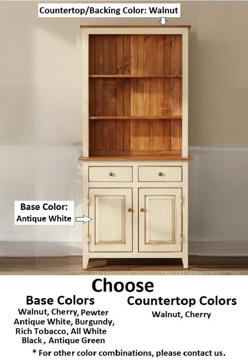 May include: A hutch with an antique white base and a walnut-colored countertop and backing. The unit features two upper shelves, two drawers with small knobs, and two lower cabinet doors. Text on the image lists available base and countertop colors.