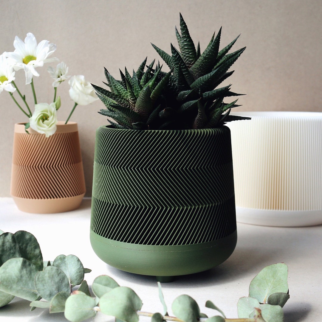 Curated visual reference: Gallery Detail: Dark Green Zig Zag Pattern Planters With Saucer Plates On