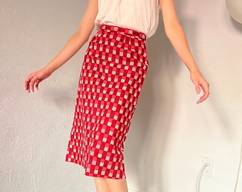 Falda tubo roja de 1960, pequeña, por encima de la rodilla, diseño de rueda vintage