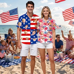 May include: A short-sleeved button-down shirt featuring a red, white, and blue American flag pattern with custom photo faces and a matching shirt with a floral and flag print, both worn with white shorts on a sandy beach with American flags.