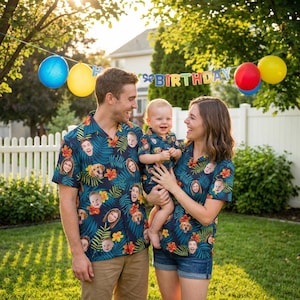 May include: Matching short-sleeve button-down shirts featuring a dark blue tropical leaf and orange hibiscus flower pattern. The fabric is customized with repeating circular portraits of faces and a golden retriever dog. The shirts have collars.
