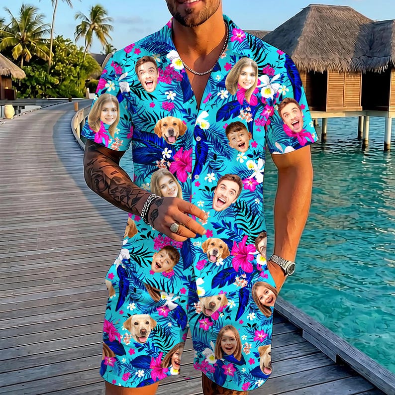 May include: A short-sleeve button-down shirt and matching shorts set in a bright turquoise blue color. The fabric features a tropical pattern of dark blue palm leaves, vibrant pink hibiscus flowers, and white blossoms interspersed with custom photo faces.