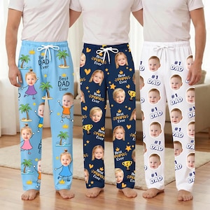 May include: Three pairs of pajama pants with custom photo prints. One pair is light blue with palm trees and the text "Best Dad Ever". Another is navy blue with "Best Papa Ever" and gold accents. The third pair is white with "#1 Dad" repeated.