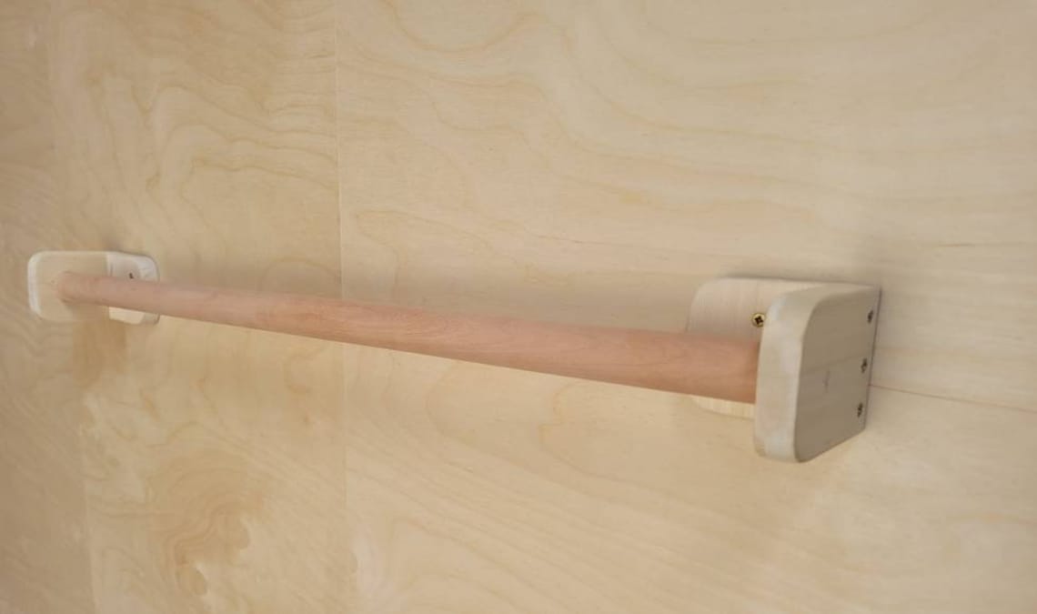 Montessori baby pull up bar. Made in the UK by The Natural Toy Etsy