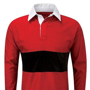 May include: A red and black rugby jersey with a white collar and a button-up placket. The jersey has a black stripe across the chest and the text "SUPER LEAGUE" on a small tag.