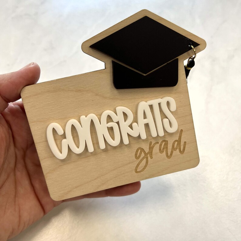 laser cut wooden gift card holder as a graduation gift. 

graduation gift-giftcard holder-grad gift-grad gifts-graduation gifts-gift card holder-personalized gifts-congrats grad-money holder-graduation gifts-etsy-money holder-graduation money holder