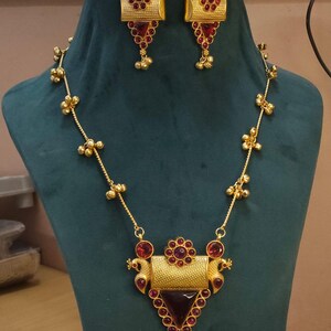 Gold Plated Red Kemp Stone Pendant Set: Bollywood Indian Jewelry