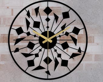 Reloj de pared metálico abstracto con diseño de estrella, moderno, negro, silencioso, hecho a mano, una declaración artística para interiores con estilo.