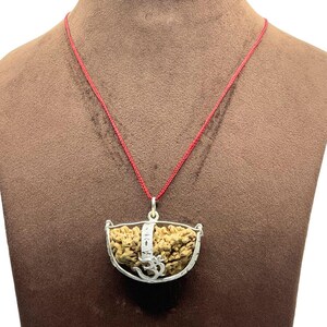 1 Mukhi Rudraksha mit Silberkappe