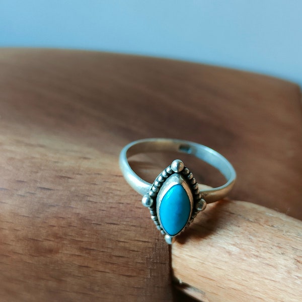 Oval Turquoise in decorative frame of silver half spheres on vintage silver ring , made of 925 silver, inspired by Native art