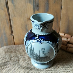 Old Wine Jug made of Cobalt Blue and Gray, glazed pottery and decorated with Cologne Cathedral, half liter, Grapes,