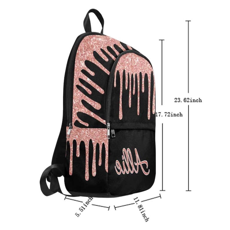 May include: Black backpack with a rose gold glitter drip design. The backpack has a zippered pocket on the front and the name "Aila" written in rose gold glitter. The backpack measures 17.72 inches tall, 11.81 inches wide, and 5.51 inches deep.