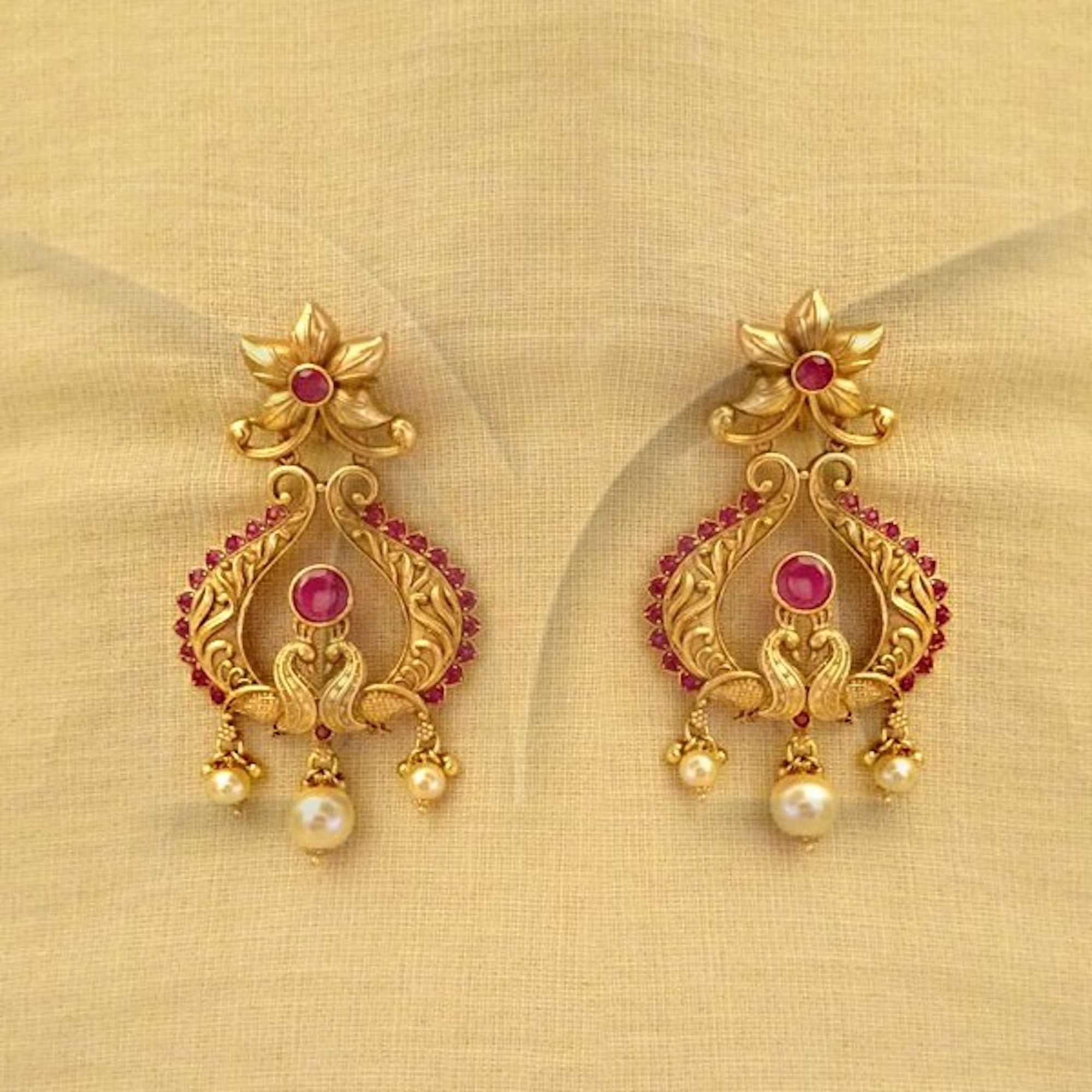 Dancing peacock earrings deals