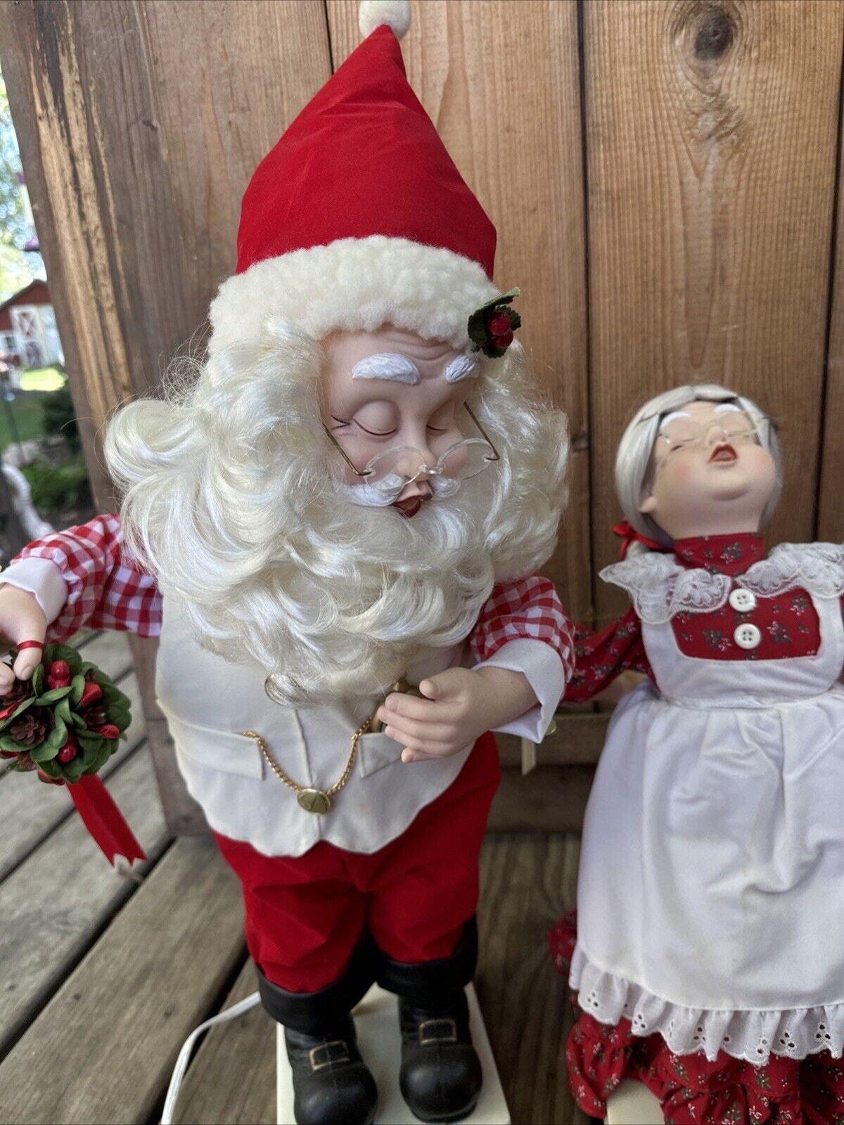 Christmas Telco Motion-ette Mommy Kissing Santa & Mrs. Claus Music