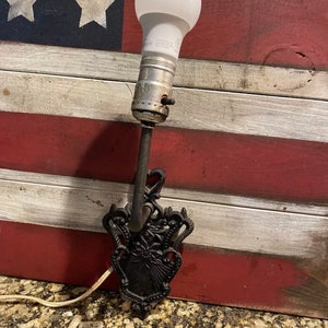 Untersetzer Wandlampe aus Gusseisen
