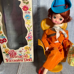 Vintage big eyed musical fashion doll