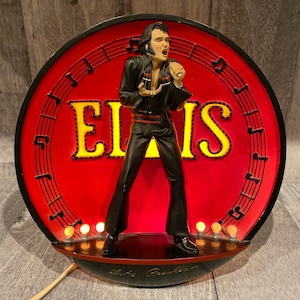 Elvis in spotlight Las Vegas lighted plate