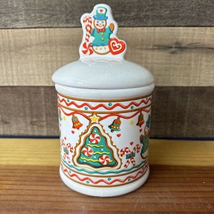 Pote de biscoitos de Natal com casa de gengibre retrô e boneco de neve vintage com tampa
