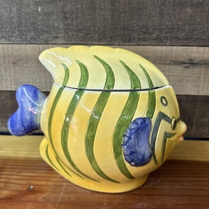 Tarro de galletas vintage con diseño de peces tropicales, amarillo y azul