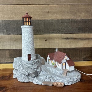 Byron Molds Handpainted Lighted Lighthouse On Cliff