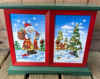 Vintage wooden advent calendar cabinet with ornaments
