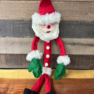 Vintage bendable felt Santa 31”