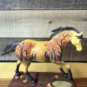 Danseuse d'automne Piste de poneys peints en boîte