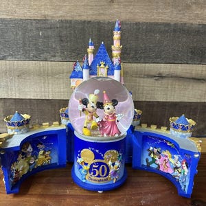 Disney Collectors RARE Disneyland 50th Anniversary Musical Castle Snow globe