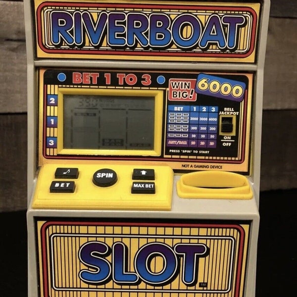 Vintage Radica Riverboat elektronische gokautomaatspel werkend. Spaarbank