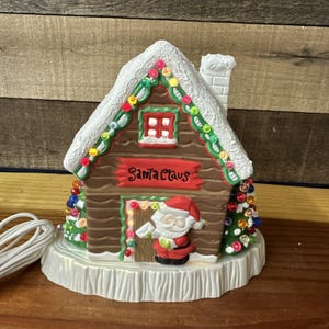 Ceramic Santa Claus Lighted House 2pc