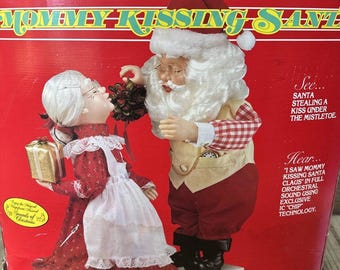 Christmas Telco Motion-ette Mommy Kissing Santa & Mrs. Claus Music