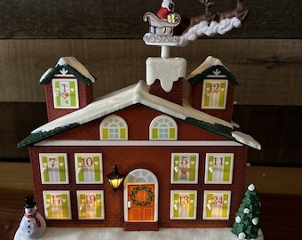 Avon Countdown to CHRISTMAS Advent Calendar House Animated Lighted Musical