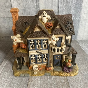 Vintage half Halloween half Christmas house