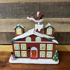 Avon Countdown to CHRISTMAS Advent Calendar House Animated Lighted Musical image 4