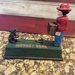 Vintage cast iron monkey and organ bank
