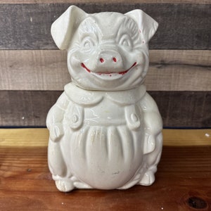 1950s American bisque Pottery Smiley pig in overalls cookie jar