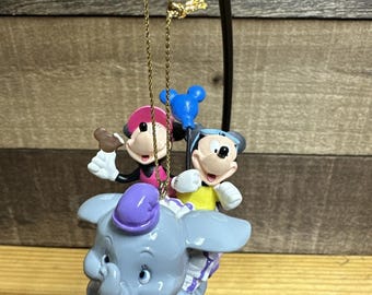 Adorno de Dumbo de los parques Disney, libro de cuentos de Mickey y Minnie